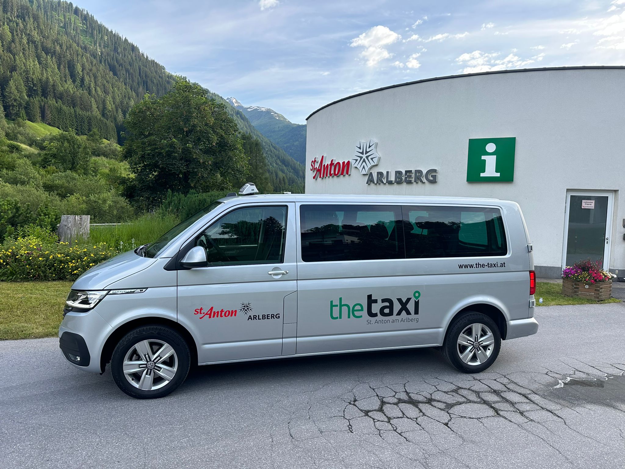 Taxi service in St. Anton - "The Taxi" vehicle parked in front of the St. Anton Arlberg visitor center.